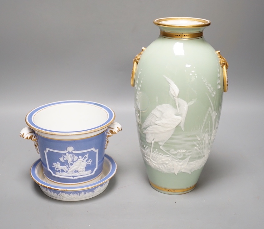 A Royal Worcester pate sur pate 'heron' vase and an early 19th century plant pot and under dish. Tallest 25cm